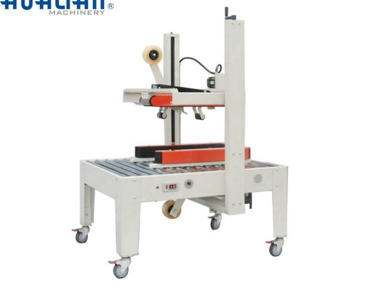 Máquina de cierre de cajas de cartón